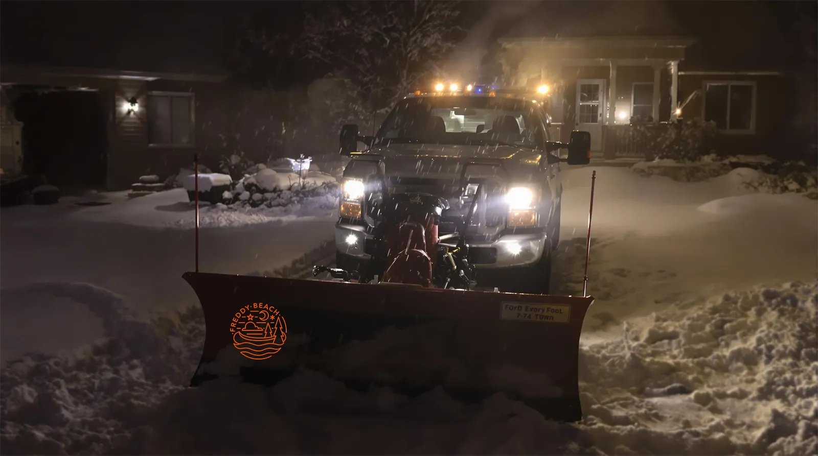 Image of a plow truck moving snow in fredericton new brunswick